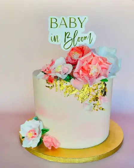 Baby in Bloom shower cake with wafer flowers and gold leaf