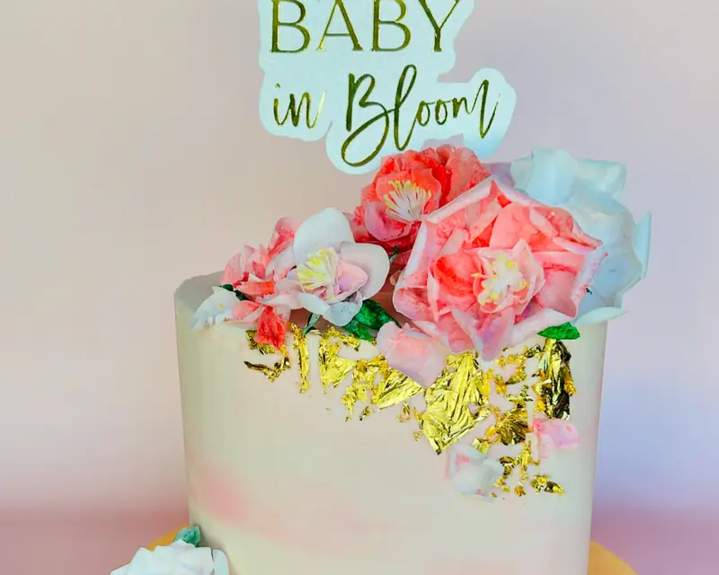 Baby in Bloom custom cake with wafer flowers and gold leaf